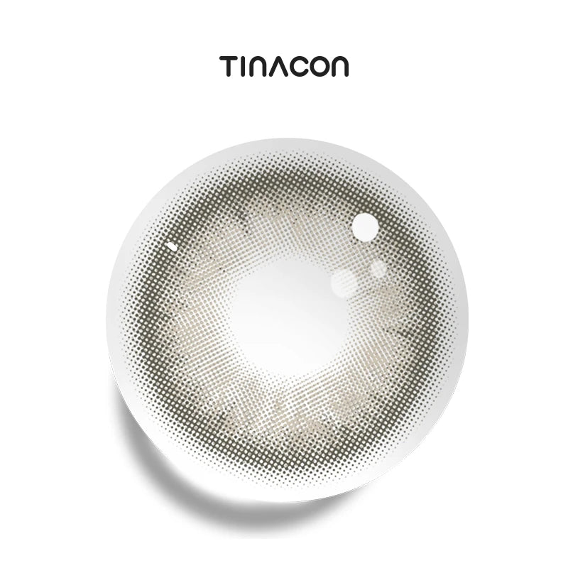 Tapestry Gray colored contact lenses exhibiting a delicate interlaced motif of silver and slate, mimicking a bespoke fabric's intricate weave.