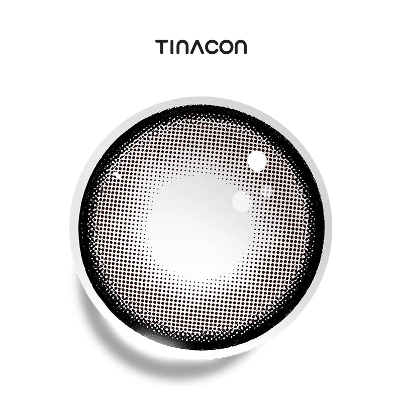 Soda Pop Black colored contact lenses exhibiting a midnight-ink perimeter that seamlessly frames a translucent center.