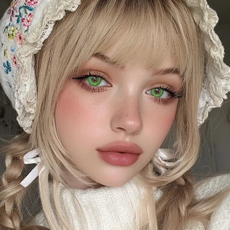 A portrait featuring Wilderness Green colored contact lenses, providing a spirited and intense eye transformation.