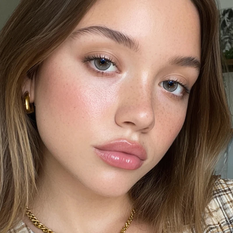 A portrait featuring Vanilla Gray colored contact lenses, offering a refreshing and airy aesthetic to any eye color.