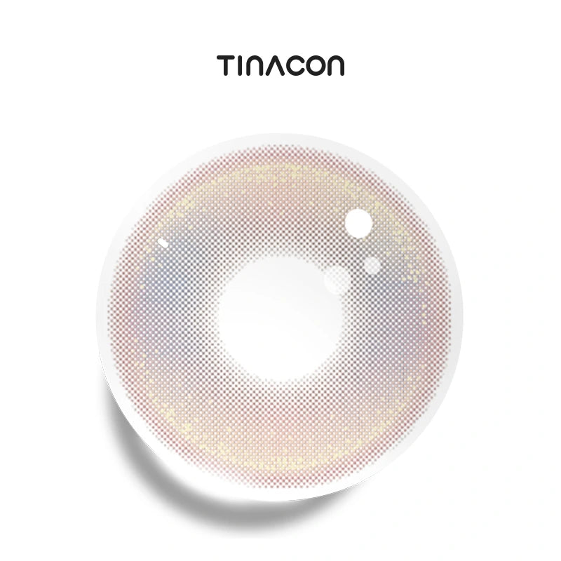 Fluffy Pink colored contact lenses exhibiting a semi-translucent Sakura gradient that blends naturally with the iris for a subtle, flushed effect.