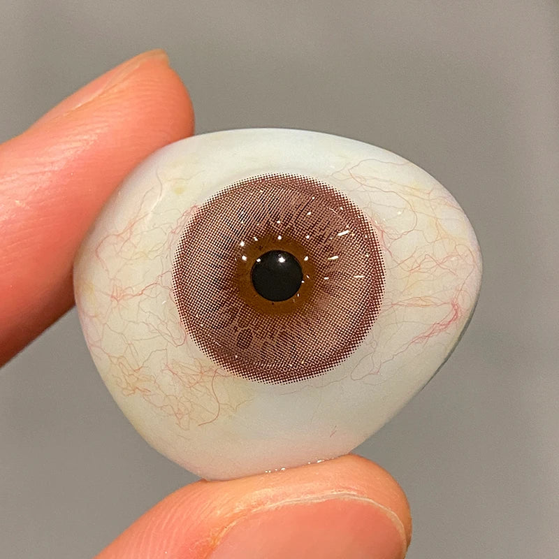 Showcasing the authentic, translucent pink tint on a fingertip, highlighting the premium soft material and airy texture.