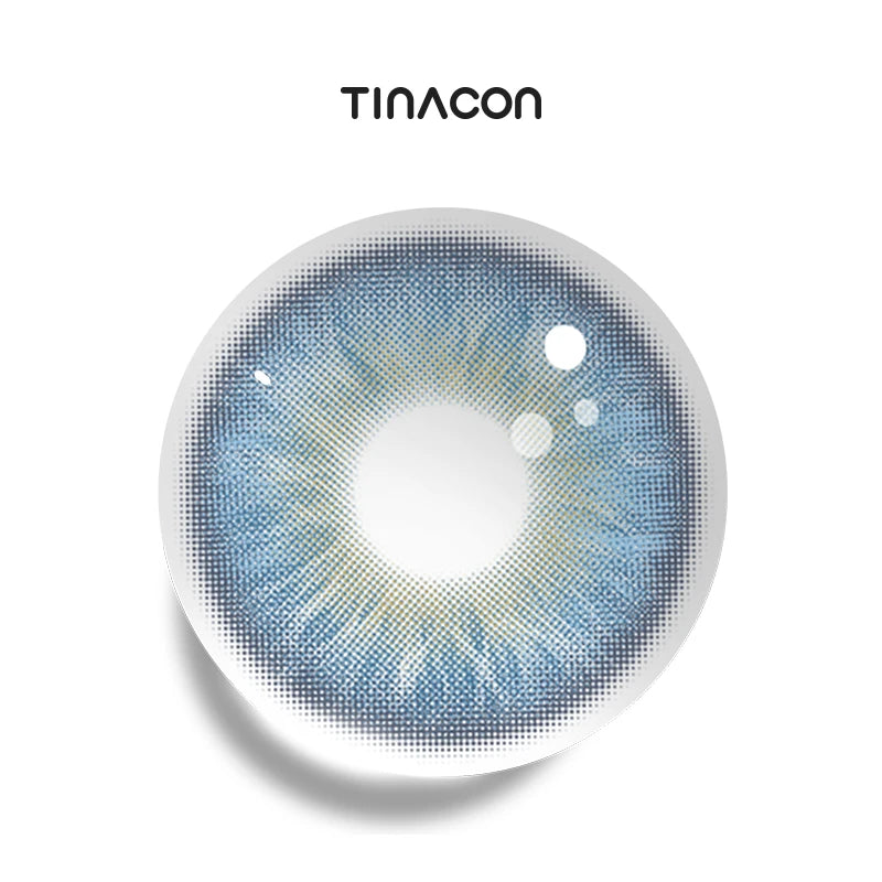 Tundra Blue colored contact lenses exhibiting a sharp, arctic gradient that transitions from a pale sapphire center to a soft, frosty perimeter.