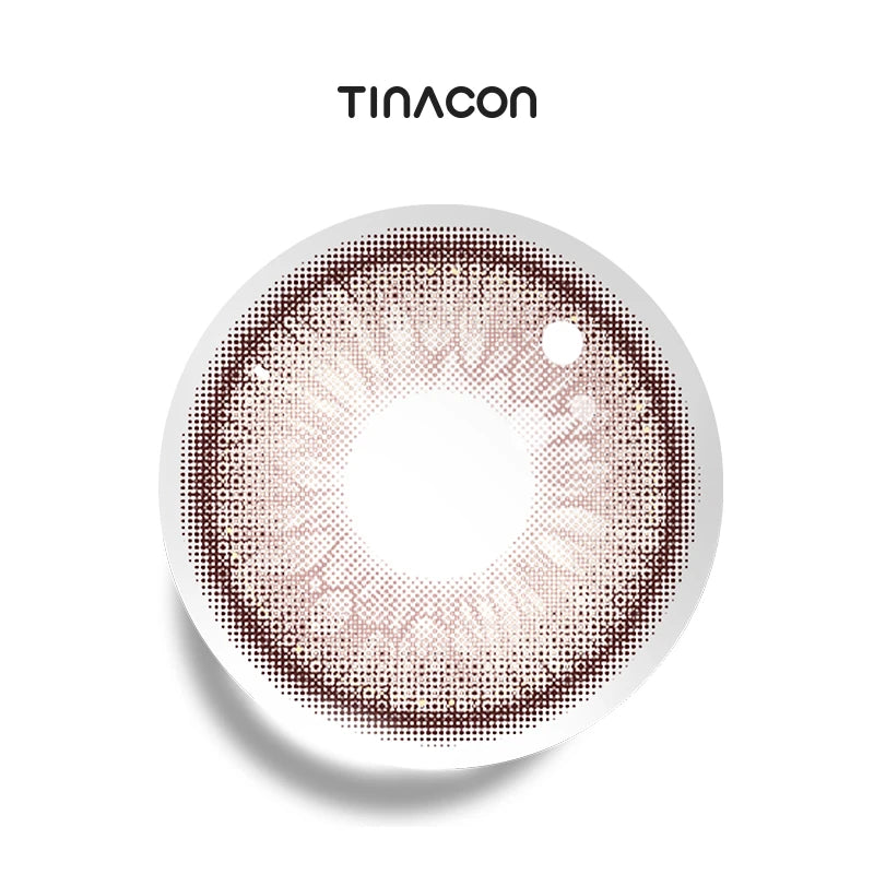 The Petal Pink colored contact lenses, featuring a delicate blush-toned pigment curated for a sophisticated, romantic look.