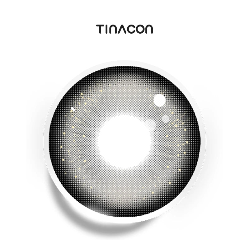 Glimmering Gray colored contact lenses featuring a dense outer ring and a starry, ash-toned center.