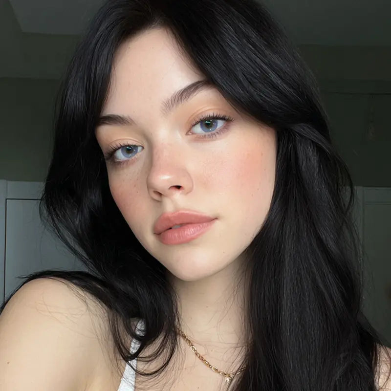 A portrait showcasing Forbidden Dusk colored contact lenses, lending a romantic and enigmatic glow to the wearer’s gaze.