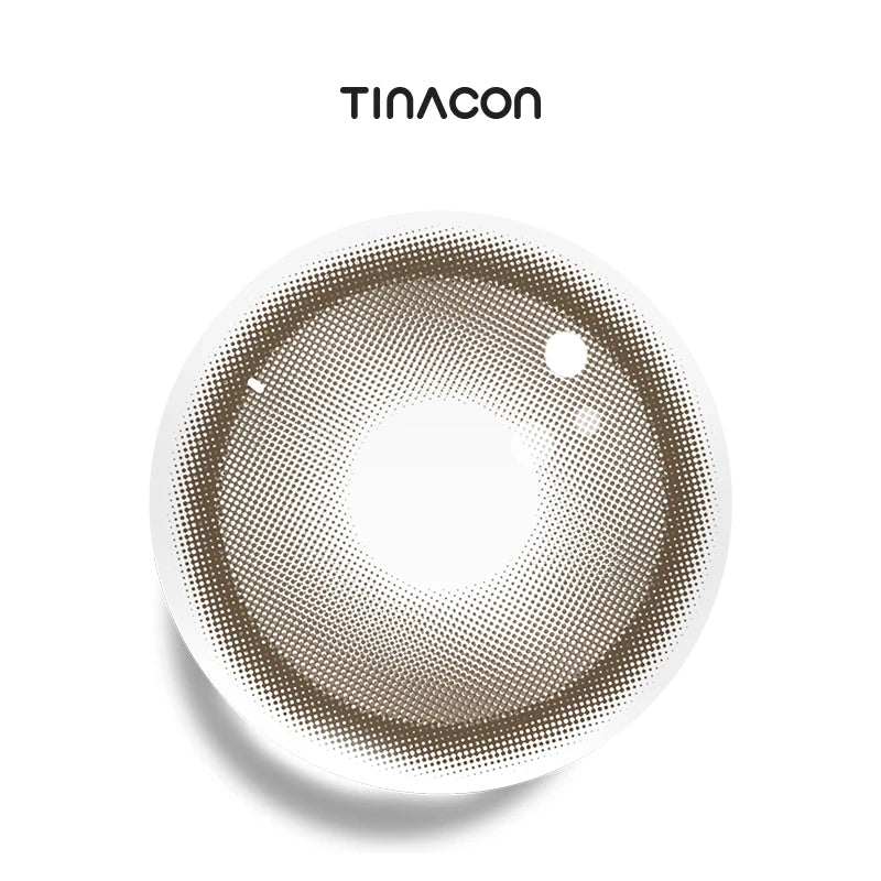 Green Tea Brown colored contact lenses exhibiting a mossy-ink gradient that blends flawlessly with warm amber for a multi-tonal, natural iris.