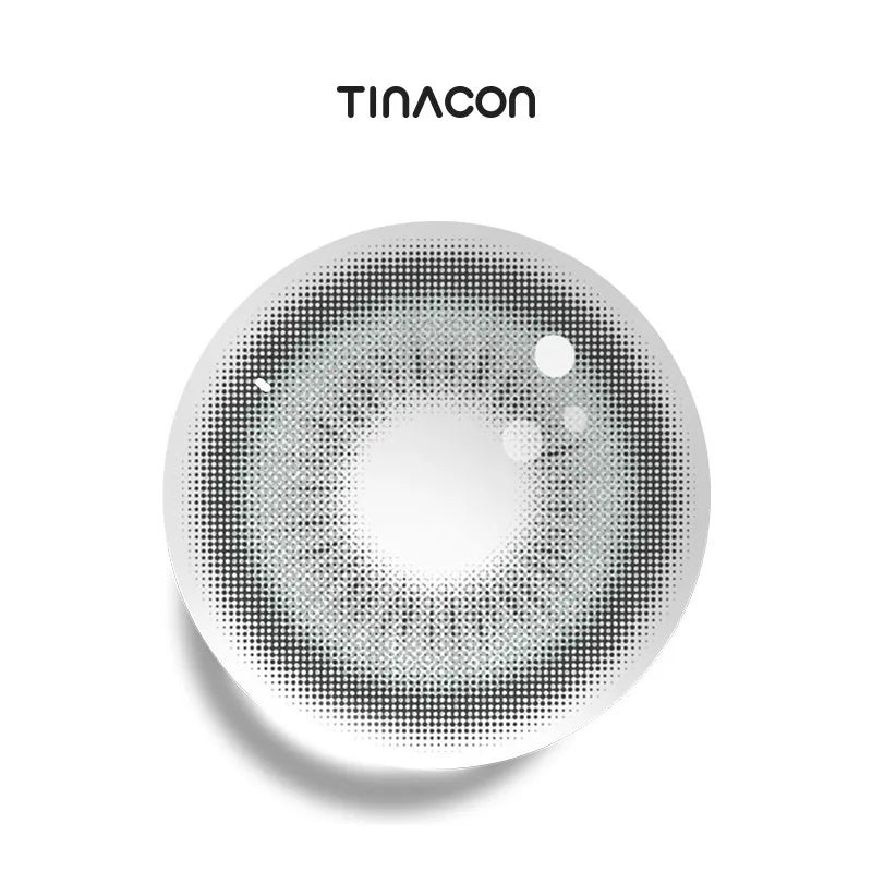 Slow Day Gray colored contact lenses featuring an aqueous tint for chic styling.