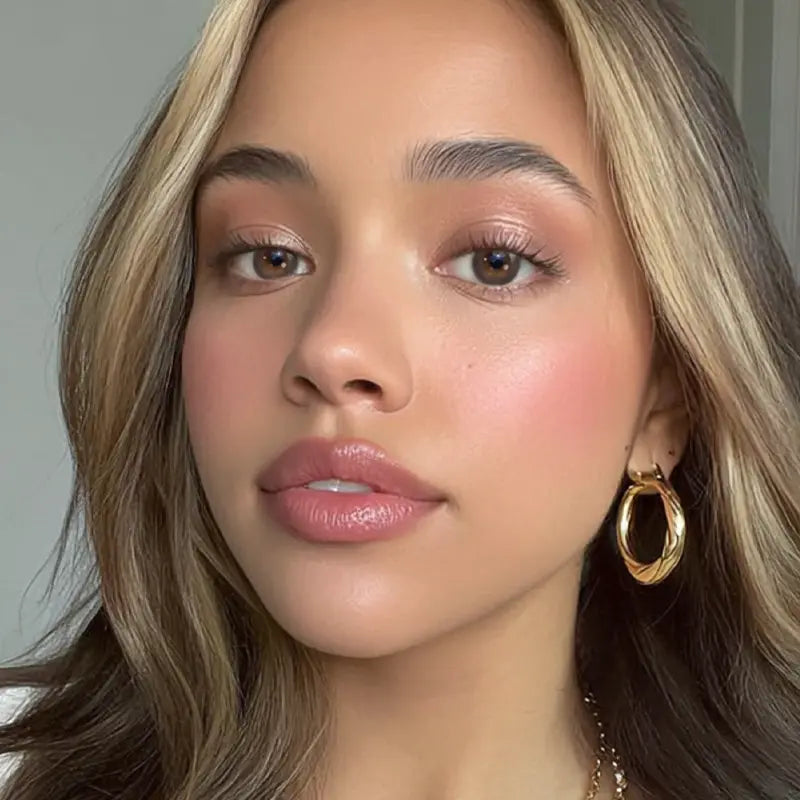 A portrait showcasing Smokeshow Gray colored contact lenses, designed to provide a polished, high-fashion finish for any look.