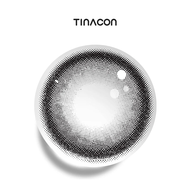 Squishy Black colored contact lenses featuring a transparent charcoal core framed by a crisp, ultra-fine ebony perimeter.