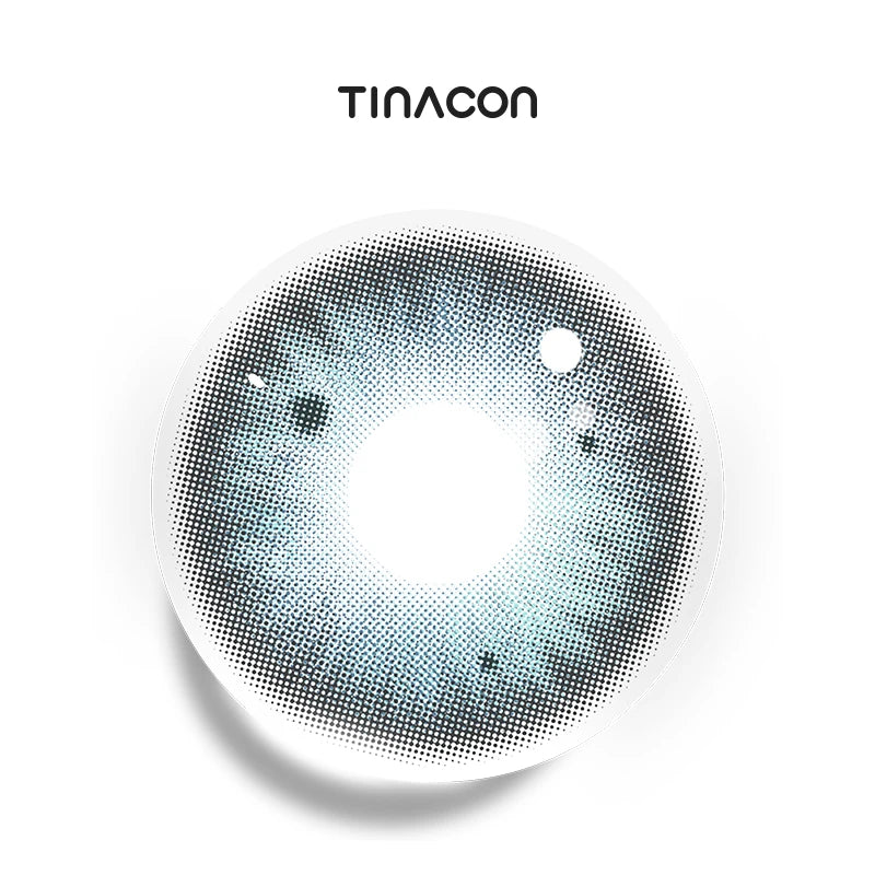 Shoreline Blue colored contact lenses exhibiting a soft azure gradient that replicates the meeting of ocean waves and the shore.