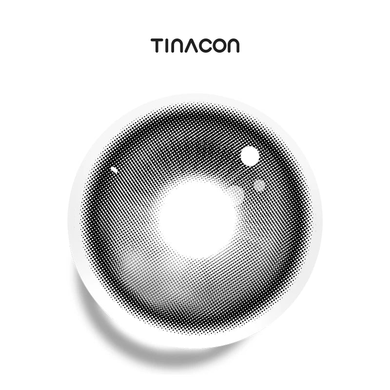 Pity Gray colored contact lenses exhibiting an ash gradient with an outer ring, crafted to create a more expansive and circular eye shape.