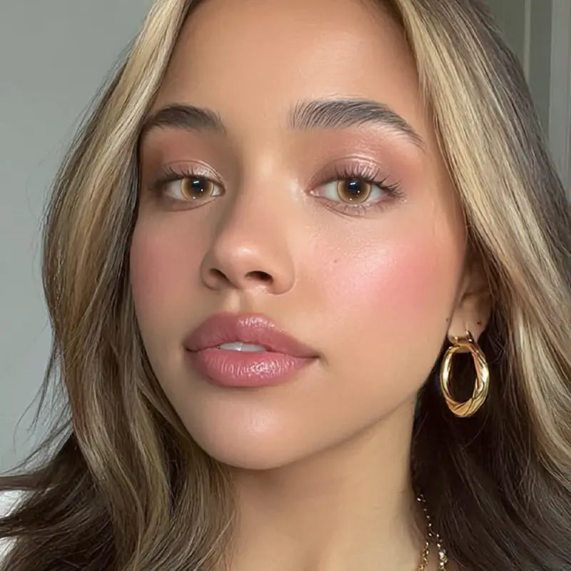 A portrait featuring Radiant Glow Brown colored contact lenses, designed to deliver a spirited eye transformation.