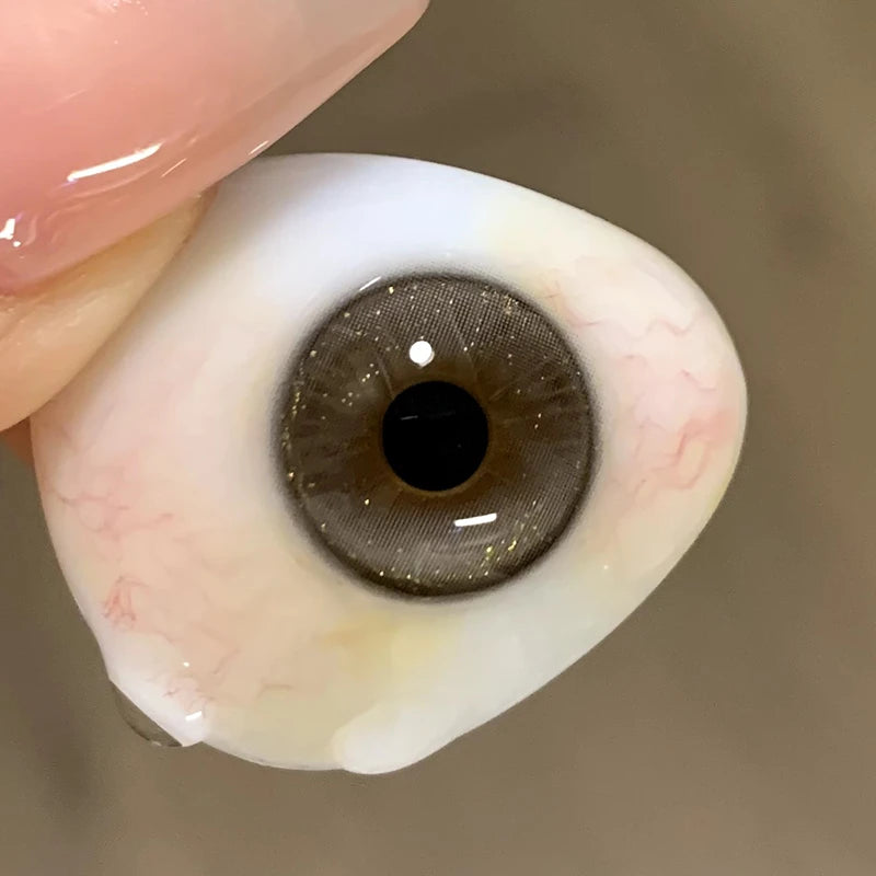 Silky Gray colored contact lenses capture a buttery smooth gradient, blending a high-standard tint with a silky finish.