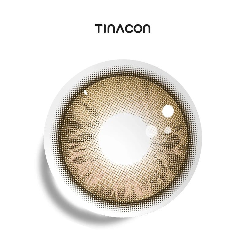 Gilded Ash colored contact lenses exhibiting a chaotic yet beautiful fusion of brown and splattered honey-gold accents.