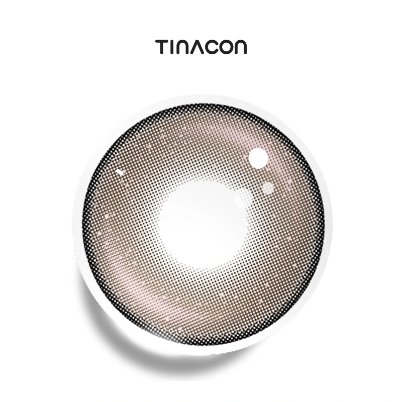 Wipe Away Pink colored contact lenses exhibiting a graceful gradient from a dusty rose center to a subtle, warm chocolate perimeter.