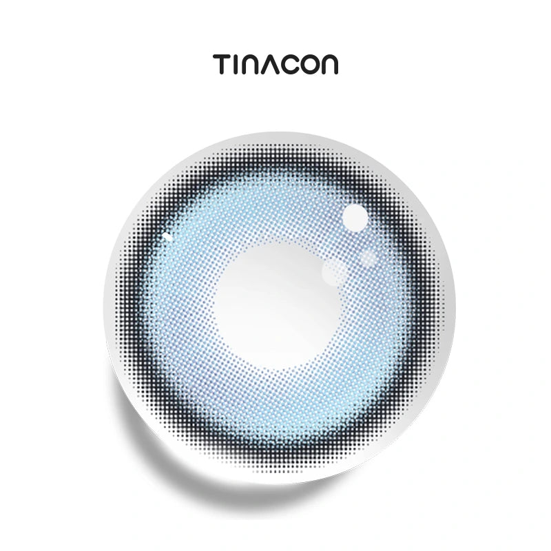 Vibe Check Blue colored contact lenses exhibiting a brilliant blue framed by a black perimeter for a graphic finish.