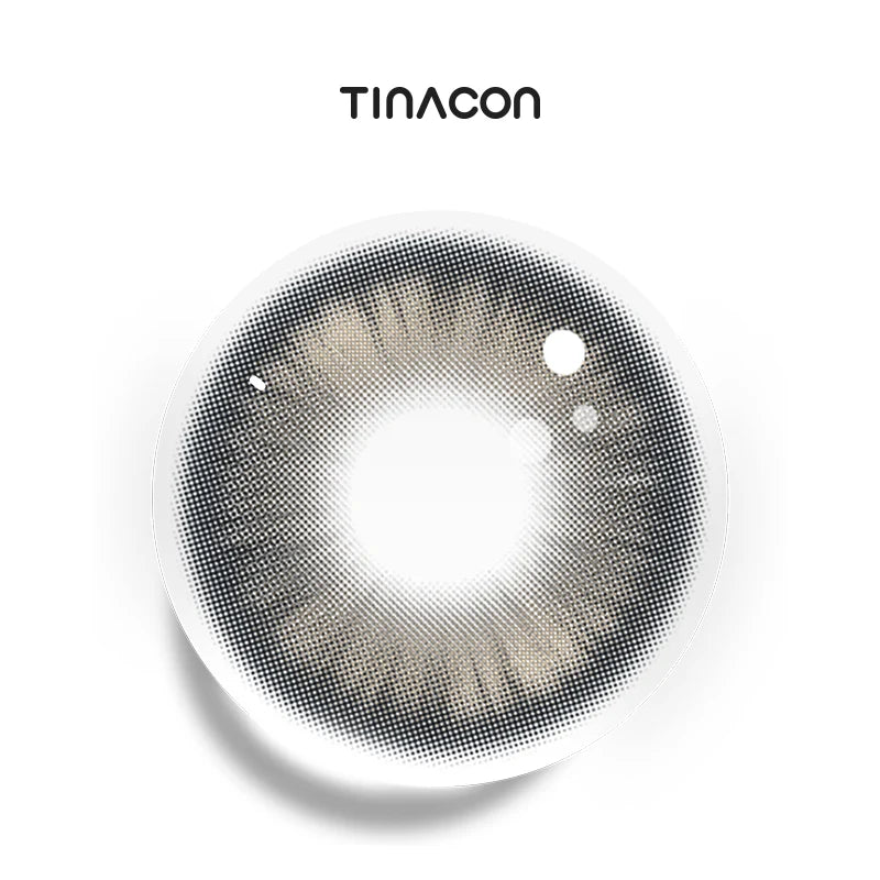 Main Character Gray colored contact lenses exhibiting a sharp frost gradient that transitions into a defined, slate-toned perimeter.