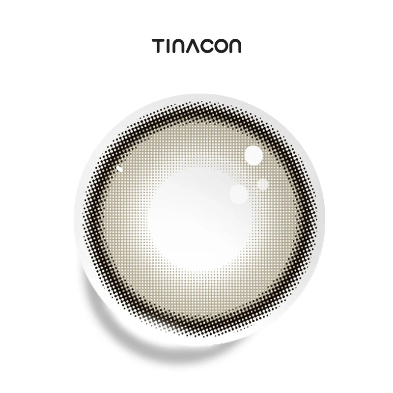 Astro Gray colored contact lenses exhibiting a seamless gradient of slate and silver, mimicking the ethereal beauty of deep space.