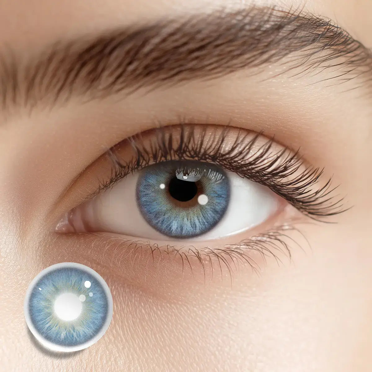 Achieving a crystalline brilliance with Tundra Blue colored contacts, featuring an icy blue tone that mimics the vast stillness of a frozen landscape.