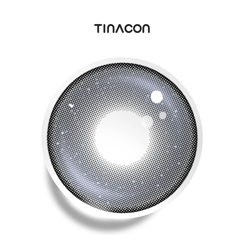 Trouble Maker Gray colored contact lenses featuring a swirling, starlit ash pigment and soft edges.