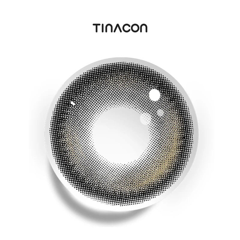 Heavy Rain Black colored contact lenses featuring a dense, obsidian canvas illuminated by a solitary, radiant streak of amber light.