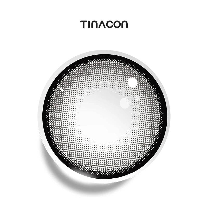 Skim Milk Gray colored contact lenses exhibiting a pearlescent ash gradient enclosed by a precise, needle-thin charcoal border.
