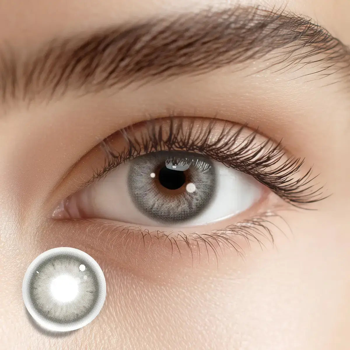 Showcasing a sophisticated gaze with Tapestry Gray colored contacts, featuring a unique pattern inspired by fine textiles.