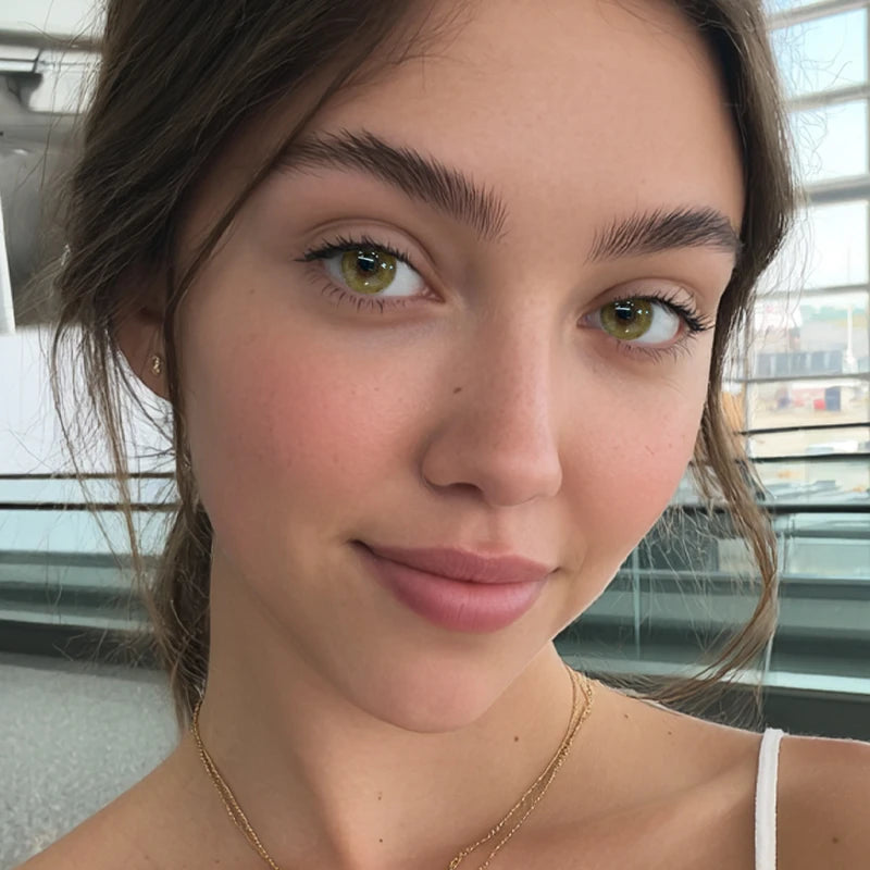 A high-standard fashion look featuring Timber Brown colored contact lenses that add a unique, memorable character to the face.